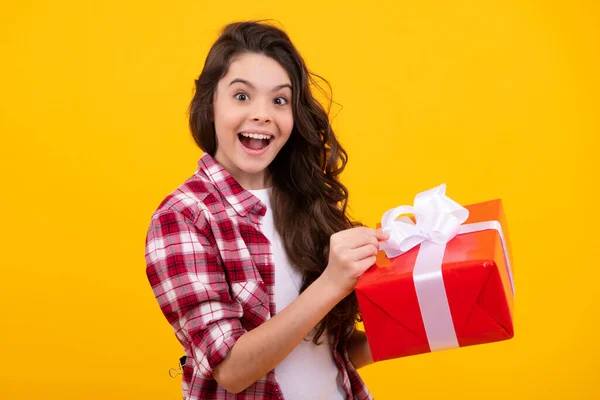 stock image Amazed teenager. Teenager kid with present box. Teen girl giving birthday gift. Present, greeting and gifting concept. Excited children