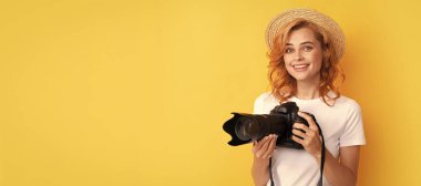 Woman isolated face portrait, banner with mock up copy space. happy woman in straw hat photographing. girl hold photo camera