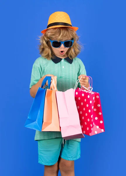 stock image Child with shopping bag in studio. Little shopper kid