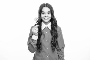 Teenage girl with lollipop, child eating sugar lollipops, kids sweets candy shop