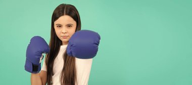 knockout. power and authority. teen girl in sportswear boxing gloves. sport challenge. punching. Horizontal poster of isolated child face, banner header, copy space