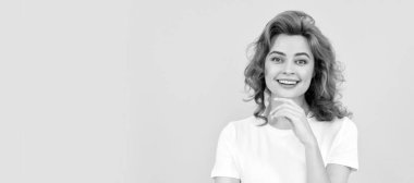 Woman isolated face portrait, banner with copy space. Portrait of beautiful cheerful redhead girl curly hair smiling laughing looking at camera