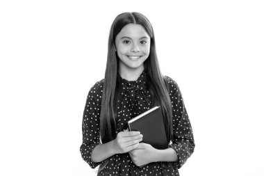 Back to school. Teenager schoolgirl with book ready to learn. School girl children on isolated white studio background. Portrait of happy smiling teenage child girl