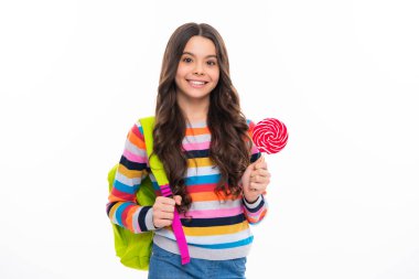 Teen girl hold lollipop caramel on white background, candy shop. Teenager with sweets suckers. Happy girl face, positive and smiling emotions