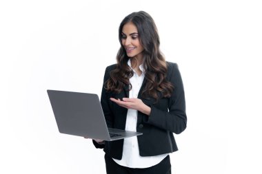 Portrait of positive cheerful ceo expert business woman work at laptop isolated over gray background. Secretary with laptop, studio portrait