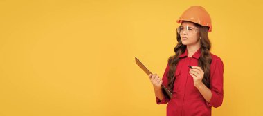 find the solution. teen girl in protective glasses. child wear eyeglasses and helmet. Child builder in helmet horizontal poster design. Banner header, copy space