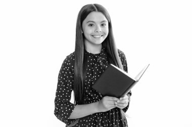 Back to school. Teenager schoolgirl with book ready to learn. School girl children on isolated white studio background. Portrait of happy smiling teenage child girl