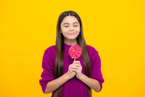 Child with lollipops candy. Stop eating sweets, sugar addiction. Teen dental care, sweet tooth