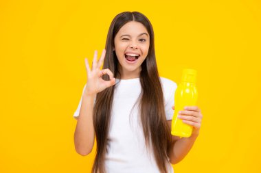 Girl teen hold water bottle. Water bottle and healthy life. Health and water balance. Drink and beverage concept