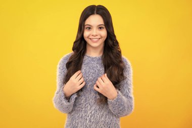 Happy teenager, positive and smiling emotions of teen girl. Pretty teenage girl in studio. Child girl portrait