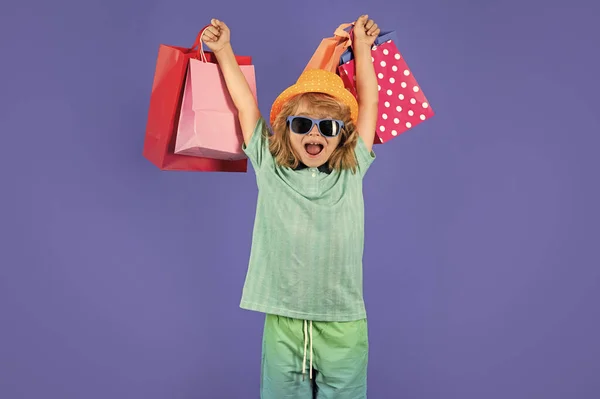 Excited Kid Many Shopping Bags Studio Funny Amazed Little Boy — Stock Fotó