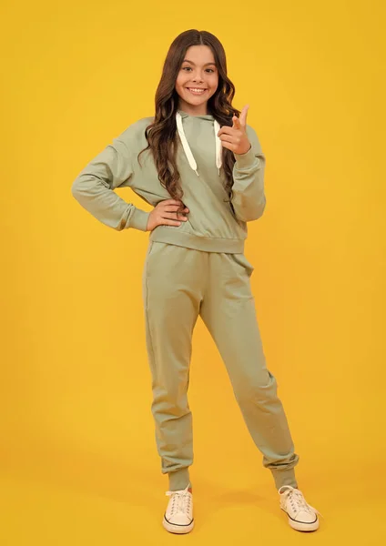 Full Length Kid Girl Sport Wear Isolated Yellow Background Sportwear Stockfoto