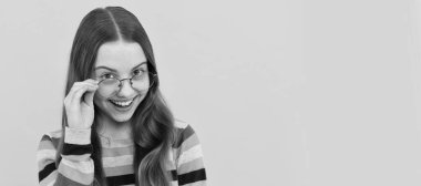 vision correction. eye health. optical eyecare. back to school. knowledge and education. Child face, horizontal poster, teenager girl isolated portrait, banner with copy space