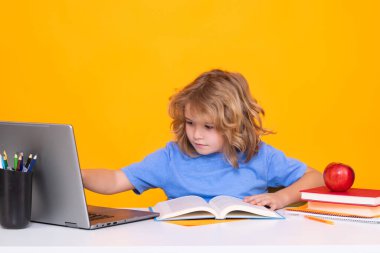 School kids isolated on yellow background. Child from elementary school. Pupil go study. Clever schoolboy learning. Kids study, knowledge and education concept