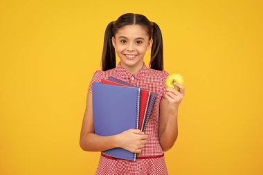 School child with book. Learning and education. Happy teenager, positive and smiling emotions of teen schoolgirl