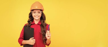 Architect teenager girl. lets work. kid make notes in folder. improve your eyesight. future engineer. Child builder in helmet horizontal poster design. Banner header, copy space