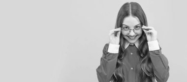 I can see you. Happy girl child look through eyeglasses. Vision acuity. Eyesight. Vision correction. Child face, horizontal poster, teenager girl isolated portrait, banner with copy space