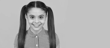 Bring inner beauty out. Happy girl portrait orange background. Child face, horizontal poster, teenager girl isolated portrait, banner with copy space