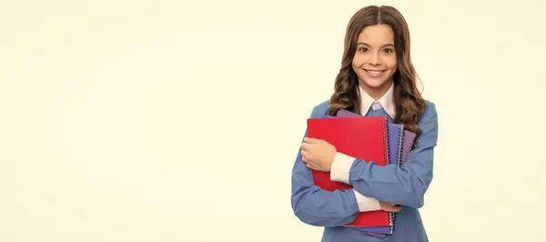 stock image happy schoolkid with copybook. teen girl with notebook. back to school. child ready to study. Banner of school girl student. Schoolgirl pupil portrait with copy space