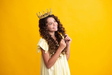 Beauty teen girl queen wear crown. Child in princess diadem. Happy teenager, positive and smiling emotions of teen girl