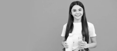 happy kid going to drink glass of milk or yoghurt, diary product. Horizontal poster of isolated child face, banner header, copy space