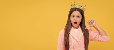 egoistic teen girl in home terry bathrobe and princess crown, egoism. Child queen princess in crown horizontal poster design. Banner header, copy space