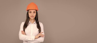 confident quality inspector. female construction worker. businesswoman in builder hardhat. Woman isolated face portrait, banner with mock up copy space