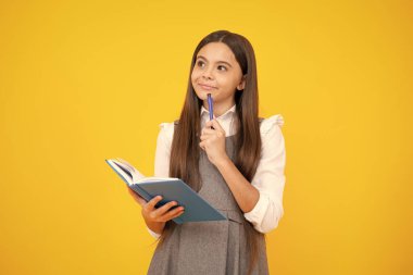School child with book. Learning and education. Thinking teenager gschoolgirl, thoughtful emotion