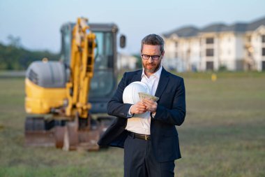 İnşaat mühendisi, inşaat yöneticisi veya denetçisi.