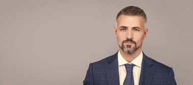 Man face portrait, banner with copy space. mature businessperson portrait in formalwear. business success. successful man in businesslike suit