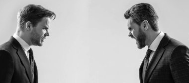 Man face portrait, banner with copy space. disagreed men partners. business competition. businessmeeting. struggle for leadership