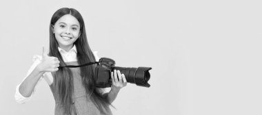 the best. childhood. teen girl taking photo. kid use digital camera. happy child photographing. Child photographer with camera, horizontal poster, banner with copy space