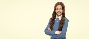 cheerful kid portrait has long curly hair isolated on white. Child face, horizontal poster, teenager girl isolated portrait, banner with copy space