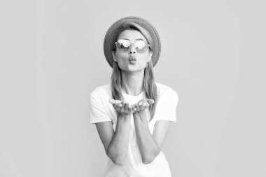 Smiling caucasian woman wearing straw hat sunglasses enjoying summer