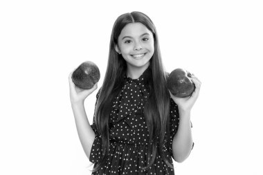 Portrait of confident teen girl with apple going to have healthy snack. Health, nutrition, dieting and kids vitamins. Portrait of happy smiling teenage child girl