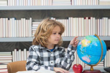 Back to school. Funny little boy from elementary school with book. Education