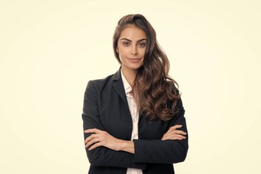 Portrait of business woman in suit crossed arms. Confidence businesswoman against grey background with copy space. Proud student girl. Beautiful businesswoman