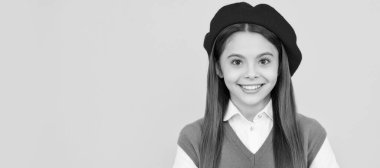 back to school. cheerful kid in beret ready to study. smiling child with book. teenage student. Child face, horizontal poster, teenager girl isolated portrait, banner with copy space