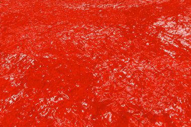 Kibarca dalgalanan kırmızı resim su yüzeyi dokusu