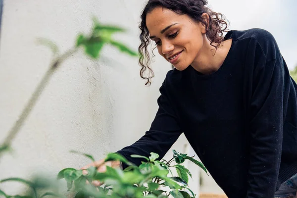 stock image Portrait of beautiful female gardener working in vegetable garden at home