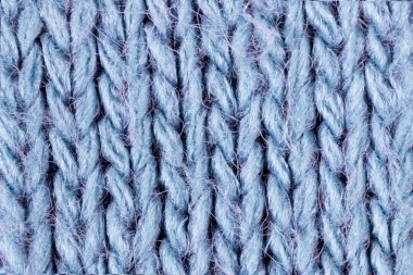 Mavi örülmüş yün kumaş dokusu..