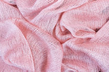 Pembe parlak kumaş arka planı dalgalı kıvrımlar halinde katlandı.