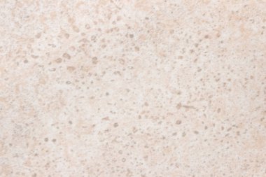 Tasarım için sıçramalı bej arkaplan.