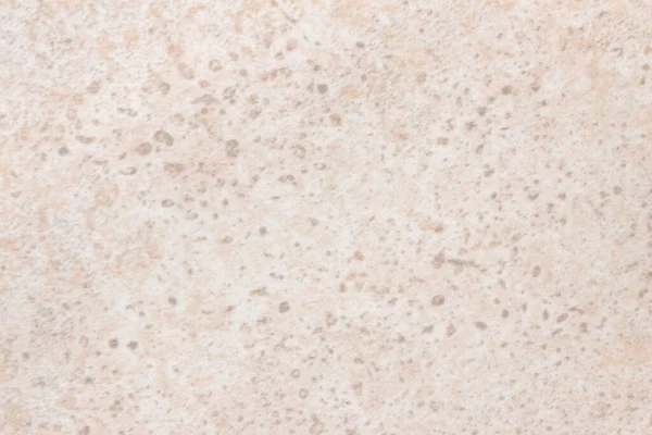 Tasarım için sıçramalı bej arkaplan.