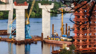 Construction of new bridges across the Dnieper River in Zaporozhye. Ukraine. City landscape.