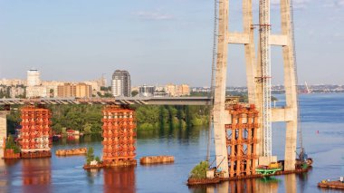 Construction of new bridges across the Dnieper River in Zaporozhye. Ukraine. City landscape.