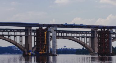 Construction of new bridges across the Dnieper River in Zaporozhye. Ukraine. City landscape.