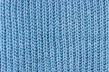 Örgü süveterin mavi kumaşı..