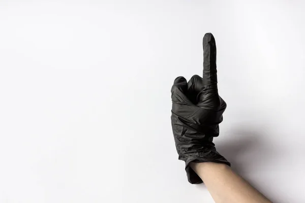 Hand Medische Handschoen Met Een Opgeheven Vinger Een Witte Achtergrond — Stockfoto