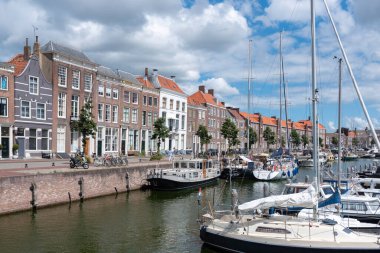 Cityscape with marina at Rouaansekaai in Middelburg. Provinz of Zeeland in the Netherlands clipart